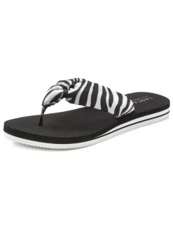 Badezehentrenner in schwarz/weiß